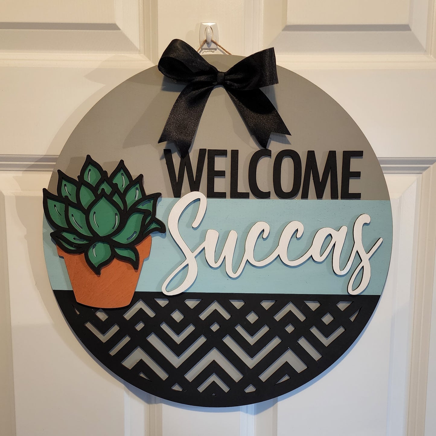 Welcome Succas Door Sign